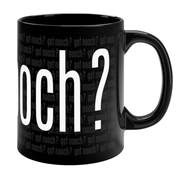 Black 11oz Got Nooch? vegan mug with white text and wraparound nooch pattern